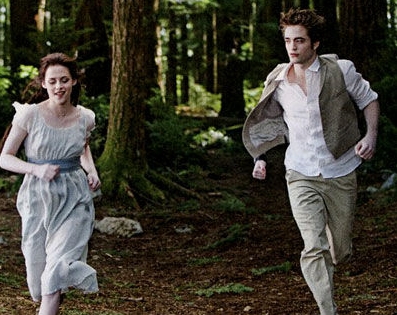 Edward Cullen and Bella Swan sparkling in the forest